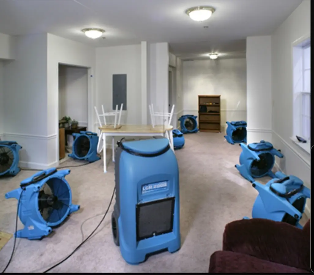 Air movers and dehumidifier setup for Water Extraction & Removal in Milo